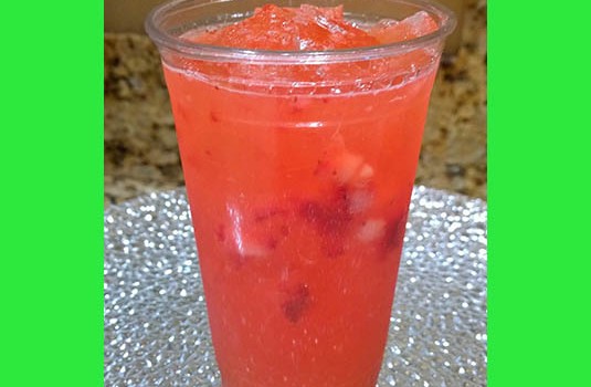 Fresh squeezed strawberry and lemonade over ice